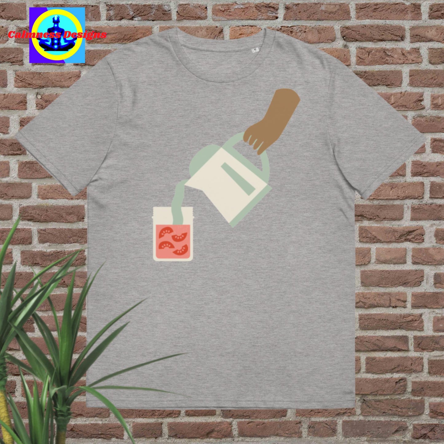 Hand Holding container-jar pouring juice in glass, Unisex organic cotton t-shirt
